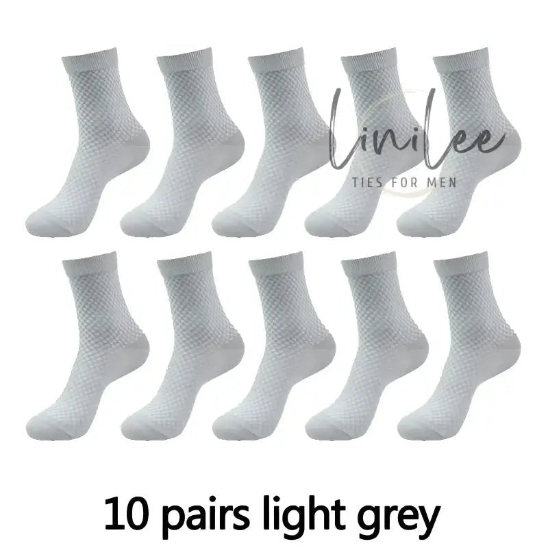 Ten pairs of light grey socks.