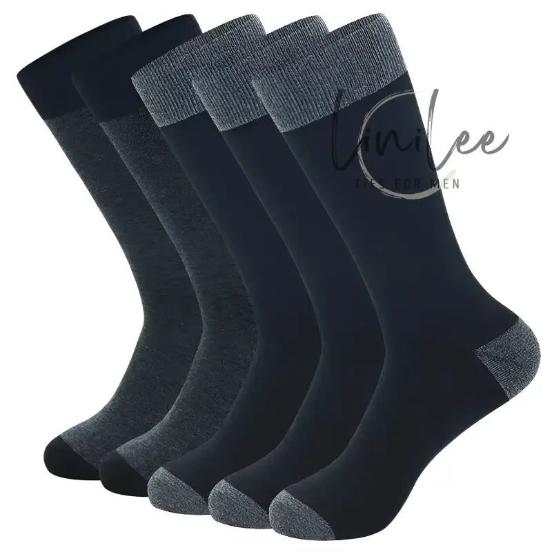 Assorted dark-colored socks.