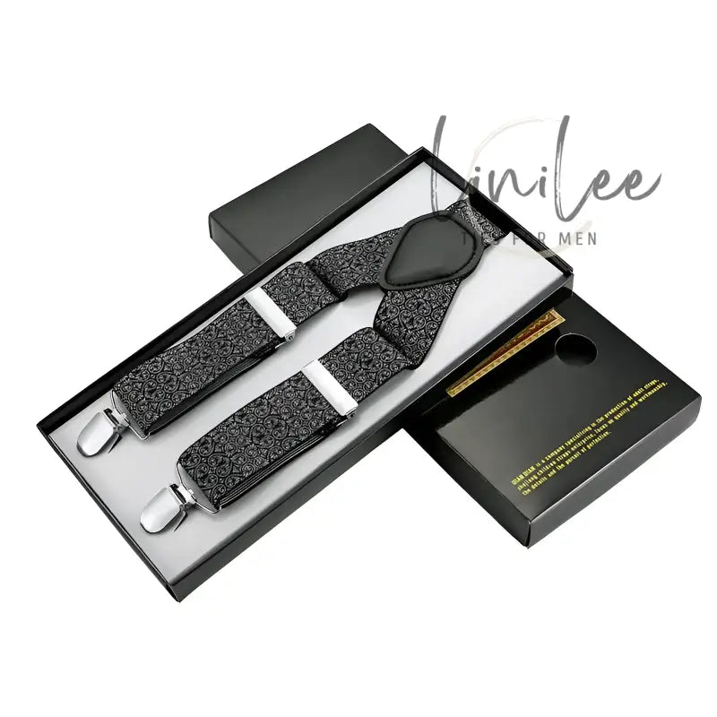 Black patterned suspenders in a box.