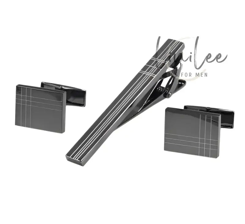 Gunmetal tie clip and cufflinks set.