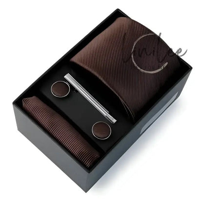 Brown tie and accessories gift set.