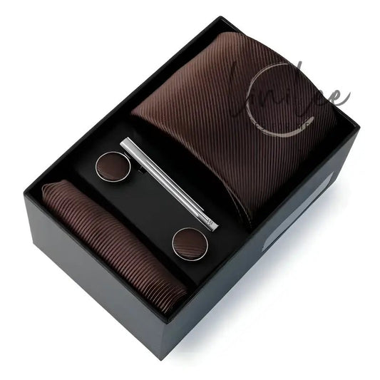 Brown tie and accessories gift set.