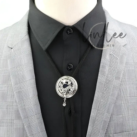 Gray plaid suit with bolo tie.