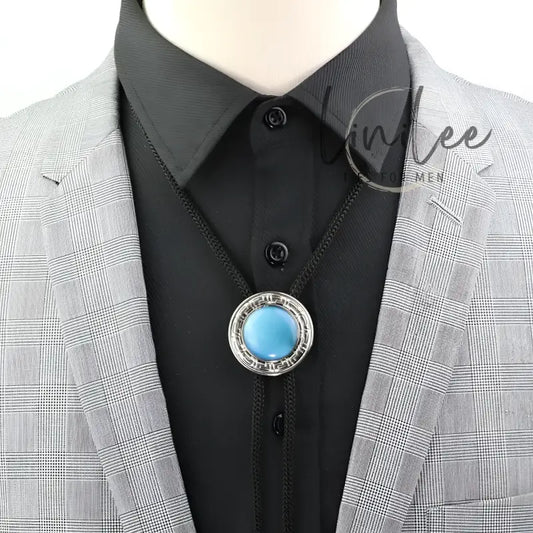 Bolo tie with a light blue stone.