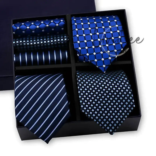 Boxed set of blue patterned ties.