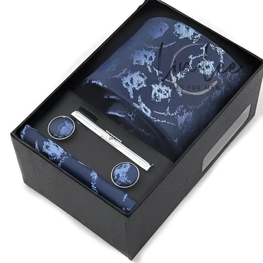 Navy blue floral men’s accessory set.