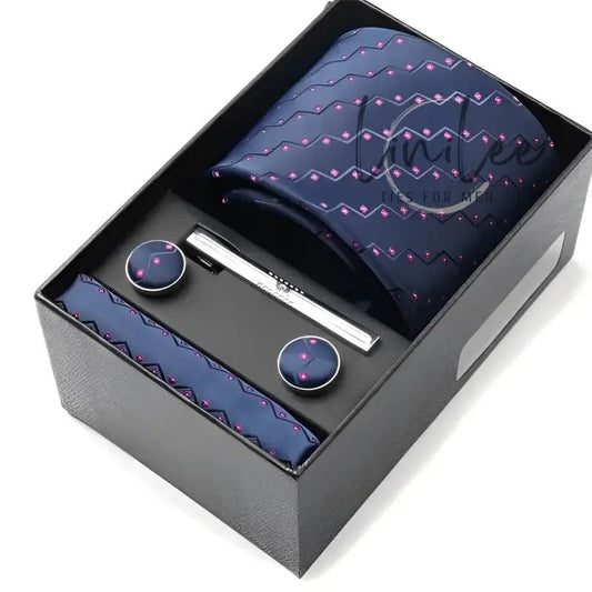 Navy blue tie set with pink accents.