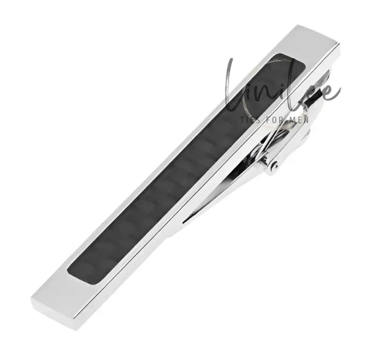 Silver tie clip with black inlay.