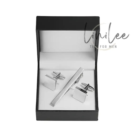 Cufflinks and tie clip set in a box.