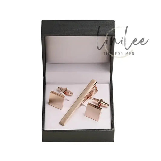 Rose gold cufflinks and tie clip set.