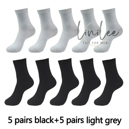 Ten pairs of socks, five black and five light gray.