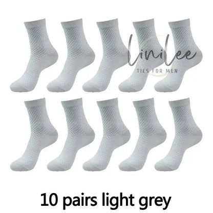 Ten pairs of light grey socks.