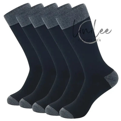 Six black socks with gray cuffs and heels.