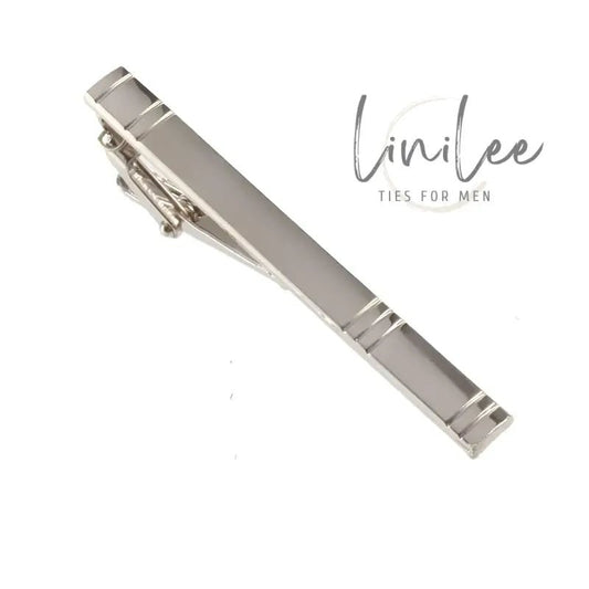Silver-toned metal tie clip.