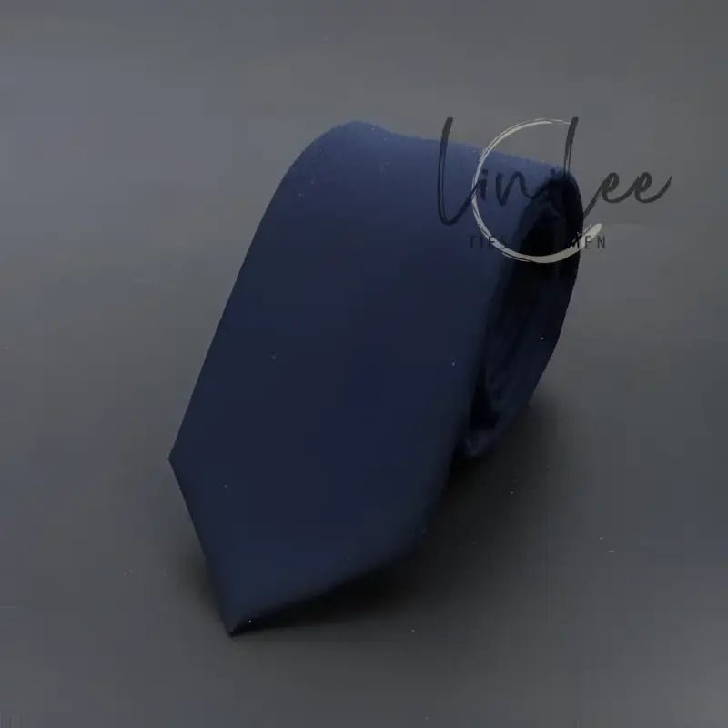 Navy blue necktie.