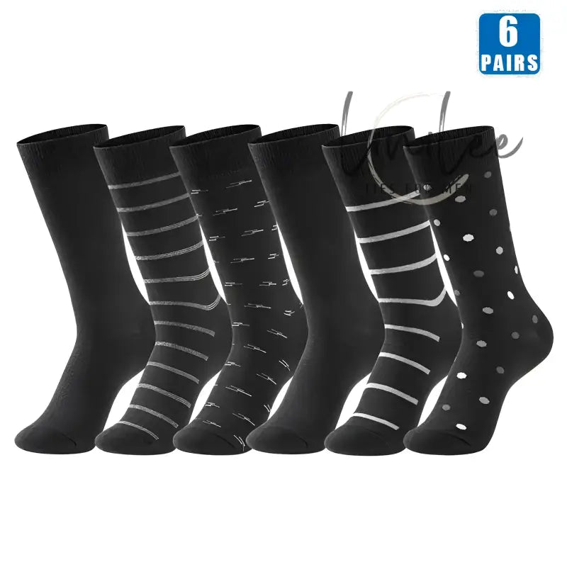 Six pairs of black patterned socks.