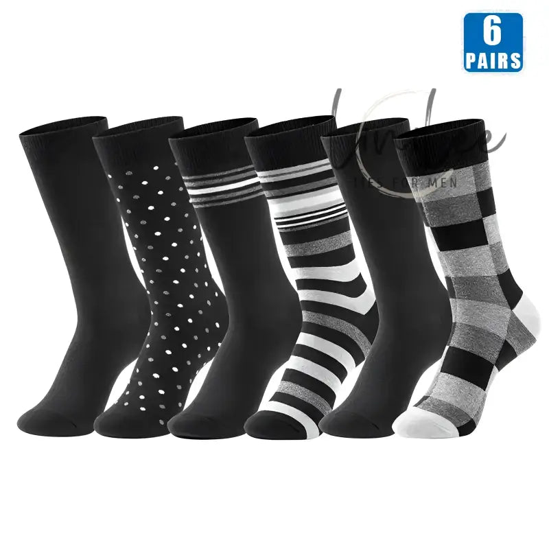 Six pairs of patterned black socks.