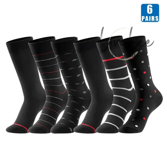 Six pairs of black patterned socks.