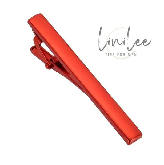 Red metal tie clip.