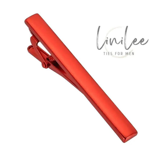 Red metal tie clip.