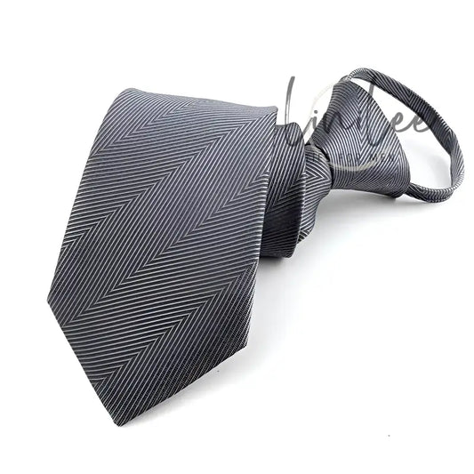Gray herringbone clip-on tie.