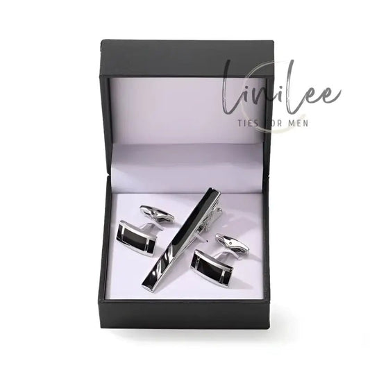 Cufflink and tie clip set in a box.