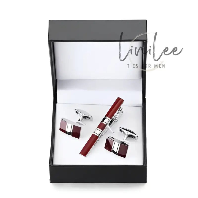 Burgundy cufflinks and tie clip set.