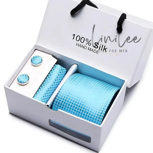 Light blue tie and cufflink set in a gift box.