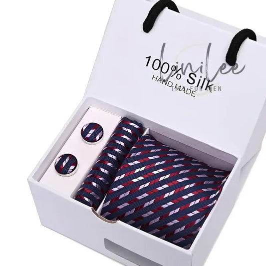 Striped tie and cufflink set in a white gift box.