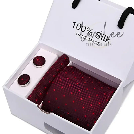 Burgundy silk tie and cufflink set.