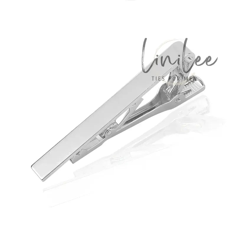 Silver-toned tie clip.