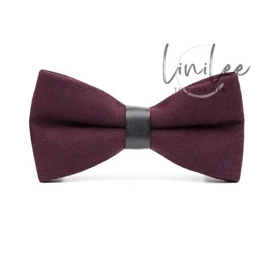 Maroon bow tie with black band.