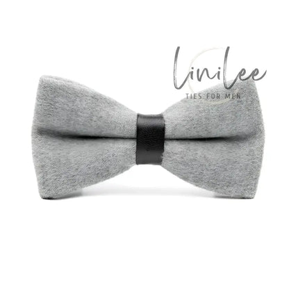 Gray felt bow tie with black leather center.