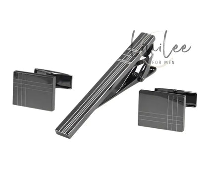 Gunmetal tie clip and cufflinks set.