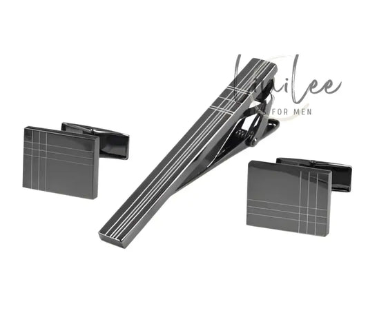 Gunmetal tie clip and cufflinks set.
